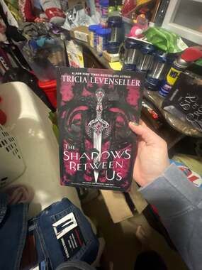 The Shadows Between Us by Tricia Levenseller (Paperback)